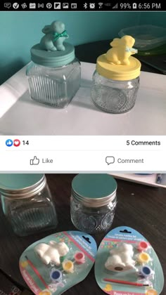 two glass jars sitting on top of a table next to each other with small plastic animals in them