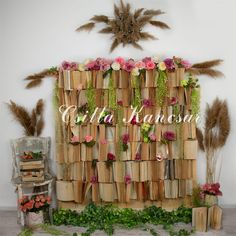 a display made out of books and flowers