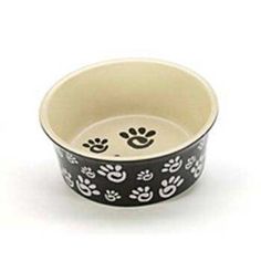 a black and white bowl with paw prints on it