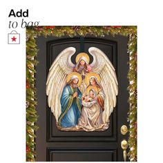 the door is decorated with an angel and baby jesus