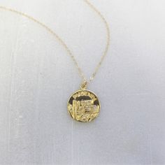 "Travel Gift- City Pendant Necklace This necklace features a medallion of your favorite US city. This makes the perfect gift or wear it yourself to remember your special place. DETAILS -Round 16mm inset pendant -Gold plated over sterling silver -A high quality 14kt gold filled chain -Choose your favorite city: Chicago Phoenix Los Angeles Dallas Atlanta Las Vegas New York City San Diego LENGTH -Please select from the drop down selection. -The standard length is normally 18\". -Model is wearing a Necklace Gold Pendant, Women Travel, Medallion Necklace, Scottsdale Az, Chain Anklet, Pendant Gold, Necklaces For Women, Favorite City, Gold Pendant Necklace