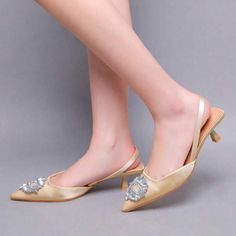 Nude Satin Sling Back Stiletto Heel With A Rhinestone Pendant And A Pointed Toe. Also In Other Colors. Price Is Firm. Elegant Heels For Banquet, Elegant Gold Heels For Banquet, Gold Embellished Slingback Pumps For Evening, Gold Embellished Slingback Pumps For Formal Occasions, Glamorous Embellished Gold Slingback Pumps, Glamorous Gold Embellished Slingback Pumps, Elegant Slingback Pumps With Rhinestones For Summer, Elegant Summer Slingback Pumps With Rhinestones, Elegant Gold Slingback Pumps For Summer