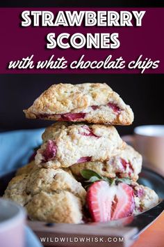 strawberry scones with white chocolate chips stacked on top of each other