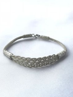 Unisex Silver Braided Bracelet, Silver Unisex Bracelet, Unique Braided Bracelet, Braided Unisex Bracelet, Silver Bracelet for Her and Him Make yourself or your loved ones happy with this beautiful braided bracelet. This woven bracelet jewelry complete your style with a special touch. Color: Silver Size: Choose size in drop-down menu. Material: 1000 Carat Silver Technique: Kazaziye silver jewelry made by hand with only 1000 carat silver or 24 carat gold. A strand of 1000 carat silver or 24 carat Elegant Braided Bangle Bracelet With Sterling Silver Clasp, Adjustable Braided Bangle Bracelet With Sterling Silver Clasp, Elegant Braided Sterling Silver Jewelry, Elegant Sterling Silver Braided Bracelet, Adjustable Sterling Silver Flexible Bracelet, Elegant Braided Bracelets As Gift, Elegant Braided Sterling Silver Bracelet Gift, Elegant Braided Sterling Silver Bracelet, Elegant Braided Bracelet Jewelry