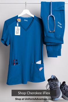 New royal blue Cherokee iFlex scrub pants and top are hanging Cna Life, Ultrasound Technician, Stylish Scrubs, Cargo Scrub Pants, Nurse Aesthetic, Uniform Advantage, Work Uniform