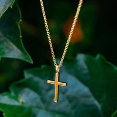 A sleek modern gold Cross necklace. Handcrafted in NYC with 18kt certified Fairmined Ecological gold that is toxic chemical free, sustainable, ethical and clean. Chain is 16" 18kt Fairmined gold. Please allow 3-4 weeks from your order date to be manufactured and ready to ship.Worldwide shipping. Free shipping within USA.Embrace newness. Purity is the new luxury. Cheap Minimalist Cross Pendant Necklace, Minimalist Gold Plated Cross Necklace, Minimalist Yellow Gold Cross Necklace With Clavicle Chain, Minimalist Yellow Gold Cross Pendant Necklace, Minimalist Tarnish Resistant Yellow Gold Cross Necklace, Minimalist Tarnish-resistant Yellow Gold Cross Necklace, Gold Necklaces With Cross Pendant And Cable Chain, Gold Minimalist Cross Pendant Jewelry, Gold Cross Pendant Cable Chain Jewelry