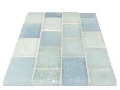 blue and white glass tile on a white background