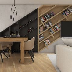 a dining room table with chairs and bookshelf in the corner next to it