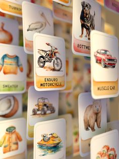 there are many pictures of animals and motorcycles on this display wall, all in different colors