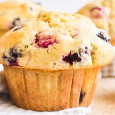 blueberry muffins sitting on top of a table