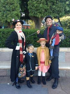 a family dressed up in costumes for halloween