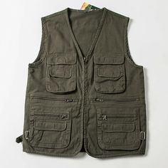 Men Multi Pockets Cargo Vest Gilet Sleeveless Jackets Work Waistcoat Zip Tops This item is only for one vest. Due to different shooting and display equipment. The color may be slightly different. Thank you for your understanding! Please note this is in Asian sizing, smaller than western size e.g. UK, US, AU. Please check the measurements carefully before making a purchase. Please allow 2-4cm discrepancy due to different measurement method. If you are not sure which size to buy, please provide he Affordable Outdoor Vest With Pockets, Cheap Men's Workwear Vest, Sleevless Jacket, Bulletproof Clothing, Cargo Vest, Patch Dress, Casual Outwear, Tactical Vest, Vests Mens