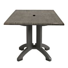 an outdoor table with a square top and cross legs, made out of concrete or steel