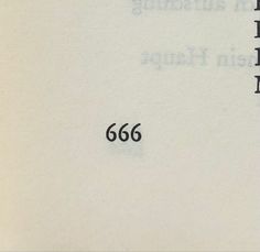 an old book with the title page number 666 written in black on white paper