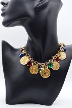 Vintage Faux Gemstones and Coins Charms Gold tone metal Necklace   .Gorgeous Timeless  Jewellery . The measurement is 47cm and 56 gm weight. In a good condition .  A beautiful quality timeless necklace for your jewellery collection . As this is a pre-owned vintage item, please take a close look at the photos as they are part of the description.  If you are unhappy with your purchase, please contact us so I can resolve things for you :) NOTES TO OVERSEAS CLIENTS: International customers are respo Metal Pendant Jewelry With Stones, Metal Charms Jewelry For Accessorizing, Gold Costume Jewelry Necklaces With Stones, Gold Costume Jewelry Necklace With Stones, Gold-tone Jeweled Metal Necklaces, Gold-tone Jewel Necklace In Metal, Gold-tone Jeweled Metal Necklace, Gold-tone Metal Necklace With Jewels, Costume Jewelry For Accessorizing