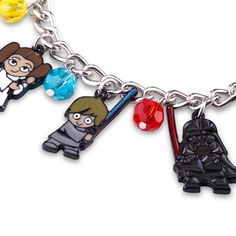 a star wars character charm bracelet with four different charms on it's linker