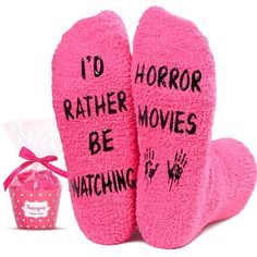 two pink socks that say i'd rather be watching for horror movies on them