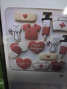 an advertisement for cookies with medical symbols on it's display case in a store window