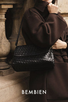 A classic flap bag inspired by the iconic ‘50s style, updated in our signature carré leather. With a braided strap and two inner compartments separated by a leather panel. Perfect for year round—wear it over a trench or knit in the fall and a silk blouse in the spring.

Photo by Gabi Mulder. Chic Double Flap Bags For Daily Use, Elegant Workwear Bag With Intrecciato Weave, Rectangular Intrecciato Weave Shoulder Bag For Work, Classic Intrecciato Satchel Shoulder Bag, Classic Intrecciato Shoulder Bag For Everyday, Chic Evening Satchel With Woven Leather, Elegant Satchel With Intrecciato Weave, Classic Everyday Shoulder Bag With Intrecciato Weave, Luxury Rectangular Flap Bag For Fall