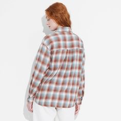 Flannel button-down shirt from Wild Fable™ with a plaid pattern. Made from lightweight cotton. Designed in an oversized fit with a collared neckline, full front button-down closure, chest patch pocket and long sleeves with buttoned cuffs. Tunic-length shirttail hem completes the stylish look. If you're not satisfied with any Target Owned Brand item, return it within one year with a receipt for an exchange or a refund. Wild Fable™: A look for every story. Relaxed Fit Button-up Flannel Shirt For Casual Gatherings, Relaxed Fit Collared Flannel Shirt For Spring, Oversized Classic Fall Flannel Shirt, Casual Plaid Cotton Shacket, Oversized Fall Flannel Shirt For Everyday, Oversized Flannel Shirt For Everyday Fall Wear, Oversized Flannel Shirt For Everyday, Fall Button-up Daywear Shirt, Cotton Button-up Flannel Shirt For Daywear