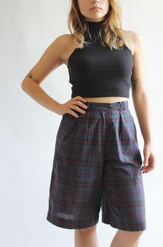 Vintage checked bermuda shorts*For women*High rise*Dark purple color*Excellent condition*Material: 67% Polyester + 33% CottonSize: MediumWaist: 29 inch / 74 cmHips: 42,5 inch / 108 cmRise: 14,2 inch / 36 cmInner length: 11,8 inch / 30 cmOuter length: 24 inch / 61 cmYou can also check other shorts from my shop:https://www.etsy.com/shop/sisuvintagestore?section_id=21302544--- SHIPPING ---Every parcel is shipped as registered priority.Shipping takes to 7-15 working days.Please allow to two working High Waist Plaid Cotton Bottoms, Fitted Plaid Shorts, High-waisted Plaid Bottoms With Built-in Shorts, Plaid Bottoms With Built-in Shorts, Plaid High-waisted Cotton Shorts, Plaid High-waisted Fitted Shorts, Fitted Plaid High-waisted Shorts, High Waist Plaid Cotton Shorts, Plaid High Waist Cotton Shorts