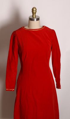 1960s Red Velvet 3/4 Length Sleeve Gold Trim Flared Christmas Dress  This dress features: *Red velvet material *3/4 length sleeve *Gold trim *Rear zipper *Flared skirt Size: X-Small  Measurements: Bust: 32" Waist: 27" Hip: 34" snug  Length: 36 1/2" Condition: Excellent If you have any questions, please ask! Find even more Vintage XX Small-X Small at: https://www.etsy.com/shop/NaughtyKittyVintage?section_id=17605974&ref=shopsection_leftnav_6 Thanks! -NaughtyKittyVintage Springfield Mo, Velvet Material, Christmas Dress, Dress Clothes For Women, Flare Skirt, Dresses Xs, Gold Trim, Red Velvet, Length Sleeve