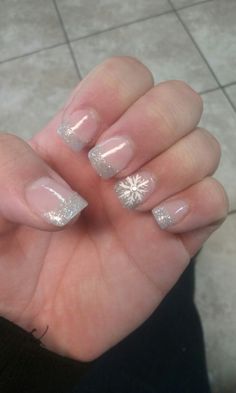 Christmas Nails Short Sparkle, French Nail Designs Winter, Winter Nails Acrylic Snowflakes Short, Snowy French Manicure, Nail Ideas For Winter Dip Powder, White French With Snowflakes, White French Tip With Snowflake On Ring Finger, Snowflake Nails Silver Glitter, Winter French Tip Nails