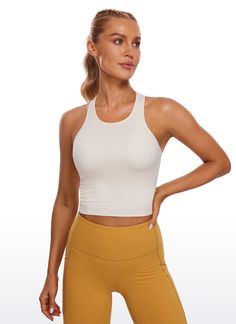 This yoga tank top of seamless series designed for comfort feeling. Y back, and scoop neck show your charming curve. Feature & Fitting: 
 Seamless collection 
 Design for yoga or running 
 Racerback 
 Built in bra & removable pads 
 Fabric: 
 Chafe-free, seamless construction 
 Sweat-wicking, soft ribbed textured fabric 
 Lightweight and stretchy 
 Solid colors: 87% Polyamide, 13% Spandex; Leopard colors: 90% Polyamide, 10% Spandex 
 SKU : R836 .Easy reach by searching the SKU Otaru, Yoga Tank Top, Summer Pregnancy, Long Sleeve Outerwear, Collection Design, Yoga Tank, Slim Fit Top, Yoga Tank Tops, Textured Fabric