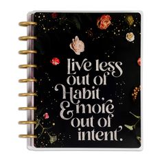 a notebook with the words live less out of habit and more out of intent