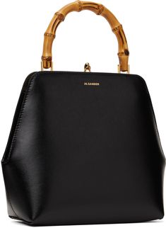 Grained calfskin top handle bag in black. · Bamboo carry handle · Logo stamp at face · Kiss-lock closure · Zip pocket at interior · Nappa calfskin lining · H7.75 x W7.25 x D3 Supplier color: Black Classic Evening Shoulder Bag With Bamboo Handle, Evening Leather Shoulder Bag With Bamboo Handle, Leather Shoulder Bag With Bamboo Handle For Evening, Luxury Formal Satchel With Bamboo Handle, Formal Black Shoulder Bag With Bamboo Handle, Formal Tote Bag With Bamboo Handle, Luxury Formal Shoulder Bag With Bamboo Handle, Evening Satchel With Bamboo Top Handle, Evening Satchel With Bamboo Handle And Top Handle