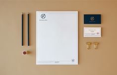 the stationery is neatly organized and ready to be used for business cards, pencils, and other items