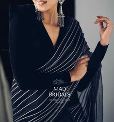 Formal Black Pre-draped Saree With Resham Embroidery, Elegant Black Pre-draped Saree With Zari Work, Formal Resham Embroidery Floor-length Saree, Elegant Black Saree For Eid, Elegant Evening Sharara With Pallu, Unstitched Black Saree For Wedding, Formal Semi-stitched Sharara With Unstitched Blouse, Elegant Black Saree For Diwali, Evening Saree Choli For Eid