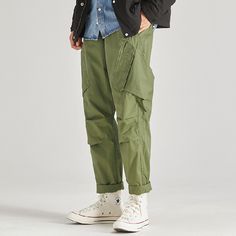 Men’s Pockets Loose Cargo Pants
Features：

 	Product ID:CP0124
 	Material:Cotton
 	Season:Spring,Summer,Autumn,Winter
 	Color:Army Green,Khaki,Gray Blue

Size Chat： Casual Green Jeans With Multiple Pockets, Urban Green Jeans With Pockets, Casual Green Cargo Pants, Green Cargo Style Work Trousers, Green Straight Leg Parachute Pants With Pockets, Baggy Green Work Pants With Pockets, Casual Green Bottoms With Cargo Pockets, Green Baggy Work Pants With Pockets, Green Cotton Jeans With Multiple Pockets