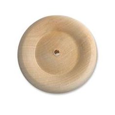 a round wooden object on a white background