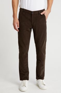 A customer favorite for comfort and versatility, these textured corduroy pants are cleanly styled and super soft. 33" inseam; 14" leg opening; 10" front rise Zip fly with button closure Front slant pockets; back button-welt pockets 93% cotton, 6% polyurethane, 1% polyester Machine wash, tumble dry Imported Men's Clothing Molasses, Corduroy Pants, Welt Pockets, Welt Pocket, Men's Clothing, Clothing Items, Nordstrom Rack, Nordstrom, Slim Fit