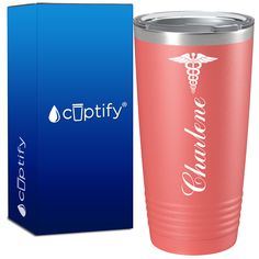 a pink tumbler cup next to a blue box with the word clipity on it