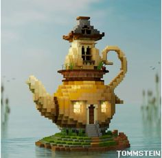 a teapot made out of legos in the water