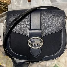 Coach George Saddle Midnight Multi (Dark Blue) Crossbody If You Are Fashionable And Loves To Be Hands-Free; This Blue Crossbody Coach Saddle Purse Is Just For You. Coach George Saddle Midnight (Dark Blue) Crossbody Refined Pebble Leather, Suede, And Snake Strap Inside Multifunction Pockets Snap Closure, Fabric Lining Outside Open Pocket Detachable Strap With 20 3/4" Drop For Shoulder Or Crossbody Wear 8 1/4" (L) X 6 3/4" (H) X 2 3/4" (W) I Am Not Accepting Any Offers Of 50% Off Or More On My Han Designer Navy Bag For Evening, Designer Navy Evening Bag, Coach Shoulder Bag With Leather Trim For Evening, Evening Coach Shoulder Bag With Leather Trim, Saddle Purse, Crossbody Coach, Coach Crossbody Purse, Handbags And Purses, Canvas Crossbody Bag