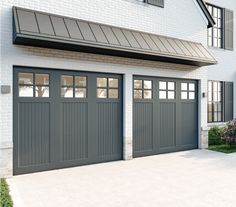 an image of a house with two garage doors