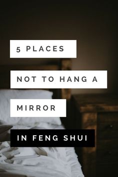 a bed with white sheets and pillows on top of it, the text reads 5 places not to hang a mirror in feng shu