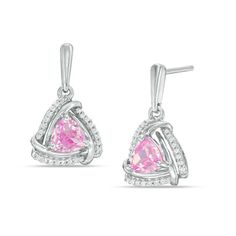 Bring on the bling with these sparkling fashion drop earrings. Crafted in sterling silver, each dainty dangle earring features a 5.0mm trillion-cut lab-created bright pink sapphire wrapped in a swirling triangular frame of polished and diamond-lined ribbons. Radiant with 1/6 ct. t.w. of diamonds and a brilliant buffed luster, these linear post earrings secure comfortably with friction backs. Pink Sterling Silver Earrings With Diamond Accents, Fine Jewelry Diamond Birthstone Earrings, Pink Diamond Earrings In Sterling Silver, Trillion Cut Earrings, Peoples Jewellers, Sapphire Stone, Yellow Diamond, Diamond Stone, Stone Earrings