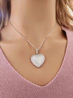 925 Sterling Silver Large Pave Heart Necklace Real 925 Sterling Silver NOT SILVER PLATED All Our 18k Gold Plated Jewelry, Plated top of 925 Sterling Silver ( NOT Brass ) High Quality Silver Pendant  High polished rhodium finish gives this pendant a stunning shiny look that lasts many years. We have hundreds Silver Jewelry in stock. If you don't see what you are looking , feel free to ask us. Trendy, dainty, luxurious, classic with modern touch, elegant and fancy, fine quality made  925 Sterling Cubic Zirconia Heart Charm Pendant Necklace, Cubic Zirconia Heart Pendant Necklace, Cubic Zirconia Pendant Heart Necklace For Her, Cubic Zirconia Heart Pendant Necklace As Gift For Her, Sterling Silver Heart Necklace With Vvs Clarity, Cubic Zirconia Heart Pendant Jewelry With Charm, White Gold Heart Cut Locket Necklace, Heart-shaped Sterling Silver Necklace With Diamond Cut, Diamond Heart Pendant Necklace As Gift For Her