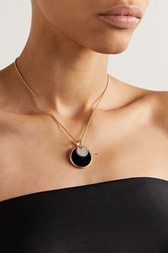 Part of the 'Elements' collection, David Yurman's necklace features a circular pendant representing a "timeless symbol of unity" since it neither has a beginning nor end. Made from 18-karat gold, it's inlaid with onyx on one side and lustrous pearl on the other. Attach the diamond-encrusted charm for added sparkle. Luxury Diamond Necklace With Large Pendant, Modern Polished Diamond Pendant Necklace, Modern Diamond Pendant Necklace With Polished Finish, Polished Round Necklace For Evening, Round Necklaces With Polished Finish For Evening, Fine Jewelry Round Evening Necklaces, Luxury White Gold Jewelry With Large Pendant, Exquisite Pendant Necklace With Polished Finish, Exquisite Polished Pendant Necklace