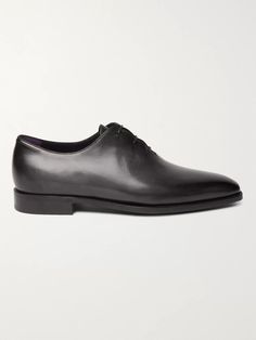 No man's wardrobe should be without a pair of black Oxfords, they're the smartest option for business meetings and more formal occasions. Expertly constructed by artisans in Italy, Berluti 's version is made from the brand's Venezia leather that's been treated by hand to give it a slight shine and unique patina. They come with wooden shoe trees so you can keep them in tip-top condition. Shown here with TOM FORD shirt, Ermenegildo Zegna suit, Kingsman tie. Timeless Goodyear Welted Dress Shoes For Business, Elegant Wingtip Dress Shoes For Business Meetings, Formal Goodyear Welted Calf Leather Dress Shoes, Luxury Goodyear Welted Dress Shoes For Formal Occasions, Classic Wingtip Dress Shoes For Business Meetings, Luxury Business Dress Shoes With Goodyear Welt, Elegant Wingtip Leather Shoes For Business Meetings, Classic Dress Shoes With Brogue Detailing For Business Meetings, Elegant Brogue Detailed Dress Shoes For Business