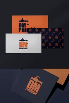 some business cards with different designs and colors are shown in this image, including the logo for