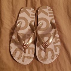 Nwot Michael Kors Sandals. Light Pink/Cream And Gold Gold Synthetic Summer Flip Flops, Michael Kors Gold Sandals For Beach, Michael Kors Gold Sandals For Summer, Michael Kors Gold Sandals With Round Toe, Michael Kors Adjustable Sandals For Beach, Casual Michael Kors Sandals For Summer, Michael Kors Trendy Beach Sandals, Trendy Michael Kors Beach Sandals, Trendy Michael Kors Flat Sandals