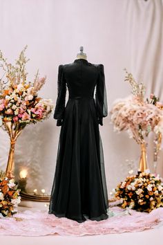 It is made of 100% organza and beaded tulle lace fabric.  The dress is 1000 grams.  It is a lined dress.  Dress length is 155 cm.  Measurements for size 38 are 92 cm bust, 72 cm waist, 96 cm hips Floor-length Dress For Eid Ceremony, Long-sleeve Lace Gown For Banquet, Maxi Length Tulle Wedding Gown, Party Long Sleeve Chiffon Abaya, Fitted Gown With Lace Sleeves For Banquet, Eid Floor-length Organza Dresses, Chiffon Long Sleeve Gown For Banquet, Long Sleeve Chiffon Gown For Banquet, Banquet Gown With Sheer Sleeves And Fitted Bodice