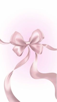 a pink ribbon with a large bow on it's end is flying in the air