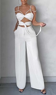 This white jumpsuit is a perfect choice for a chic summer look! Featuring cutout detailing and sleeveless design, it's an effortless way to look stylish! Gentle Dry Clean Only Colour may vary due to lighting on images. The product images (without model) are closest to the true colour of the product.Item runs true to size chart and is cut to suit our size chart. Please refer to our size chart for the best fit. Do not size up or down. White Fitted Jumpsuits And Rompers, Fitted White Solid Color Jumpsuits And Rompers, Fitted White Jumpsuits And Rompers, Summer Sleeveless Cutout Jumpsuits And Rompers, Summer Solid Color Jumpsuits And Rompers For Night Out, Summer Solid Jumpsuits And Rompers For Night Out, Summer White Solid Color Jumpsuits And Rompers, White Summer Jumpsuits And Rompers Solid Color, Casual Summer Jumpsuits And Rompers With Cutout