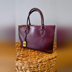 Ralph Lauren Burgundy Saffiano Leather Bag. Excellent Condition/Never Used Comes With A Shoulder Strap, Has Two Spacious Zipper Closure Compartments. Approx : 10 In Height X 6 In Width X 14.5 In Length Ralph Lauren Travel Bag, Ralph Lauren Handbags, Ralph Lauren Bags, Ralph Lauren Leather, Black Satchel, Leather Satchel Bag, Canvas Handbags, Satchel Handbags, Nylon Bag